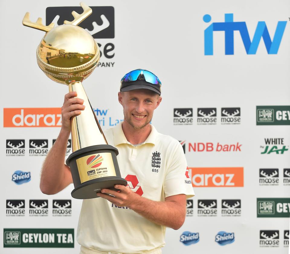 <p>Joe Root, the England captain holds the ‘Moose Clothing Cup 2021’ trophy</p> (ECB)