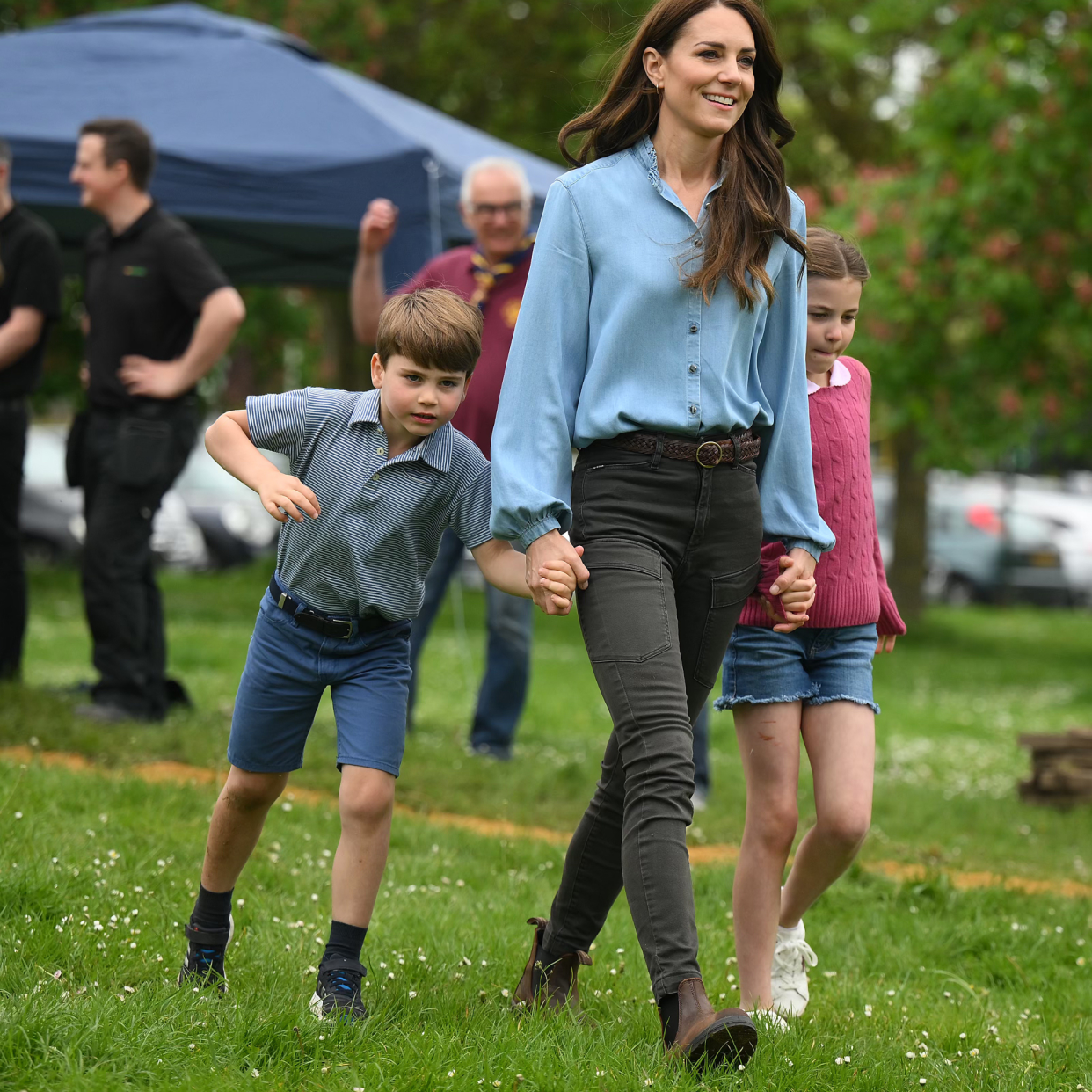  Prince Louis of Wales and Princess Charlotte of Wales walk with their mother, Catherine, Princess of Wales while taking part in the Big Help Out, during a visit to the 3rd Upton Scouts Hut in Slough on May 8, 2023 in London, England. The Big Help Out is a day when people are encouraged to volunteer in their communities. It is part of the celebrations of the Coronation of Charles III and his wife, Camilla, as King and Queen of the United Kingdom of Great Britain and Northern Ireland, and the other Commonwealth realms that took place at Westminster Abbey on Saturday, May 6, 2023. 