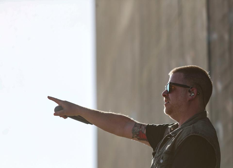 El-P of Run The Jewels points out to the crowd while performing on the main stage during the Coachella Valley Music and Arts Festival in Indio, Calif., Sunday, April 17, 2022.