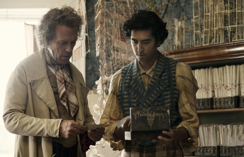 This image released by Fox Searchlight Pictures shows Hugh Laurie, left, and Dev Patel in a scene from the film "The Personal History of David Copperfield." (Dean Rogers/Fox Searchlight Pictures via AP)