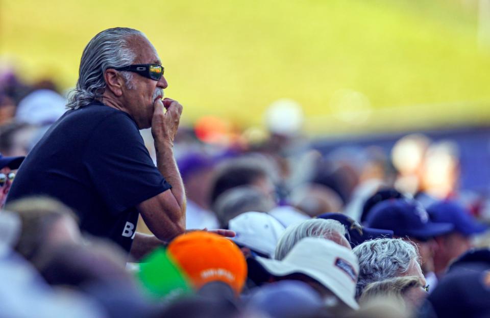 Vanderbilt fan Jeff Pack continues to whistle after stirring up some LSU fans during the third inning of Saturday's SEC semifinal game.