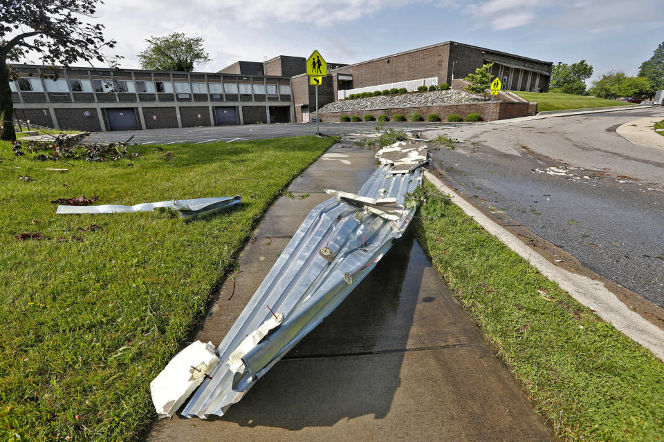 This Sunday, June 16, 2019, photo shows debris behind Beech Grove High School in Beech Grove, Ind., after a tornado moved through the area. Weather officials say severe storms in central Indiana caused floods and produced several tornadoes. (Kelly Wilkinson/The Indianapolis Star via AP)