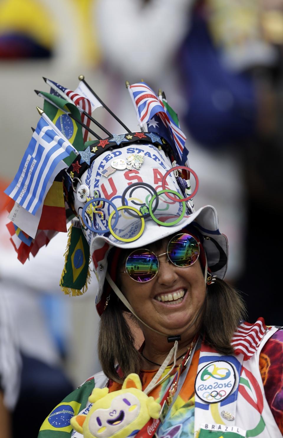 <p>A fan waits for the start of a Group E match of the Women’s Olympic Football Tournament between Brazil and China at the Rio Olympic Stadium in Rio de Janeiro, Brazil, Wednesday, Aug. 3, 2016.(AP Photo/Leo Correa) </p>
