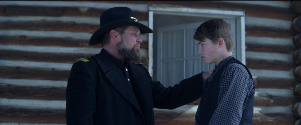 From left, Brian Presley and son Jackson Presley play father and son in the period drama "Hostile Territory," a Western inspired by a true story. Presley, who grew up in Tulsa, also wrote, produced and directed the Western. Saban Films photo