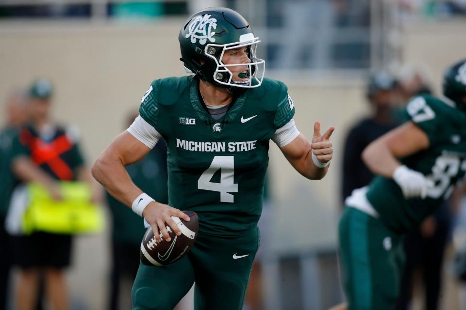 Michigan State quarterback Sam Leavitt scrambles against Maryland during an NCAA college football game, Saturday, Sept. 23, 2023, in East Lansing, Mich. (AP Photo/Al Goldis)