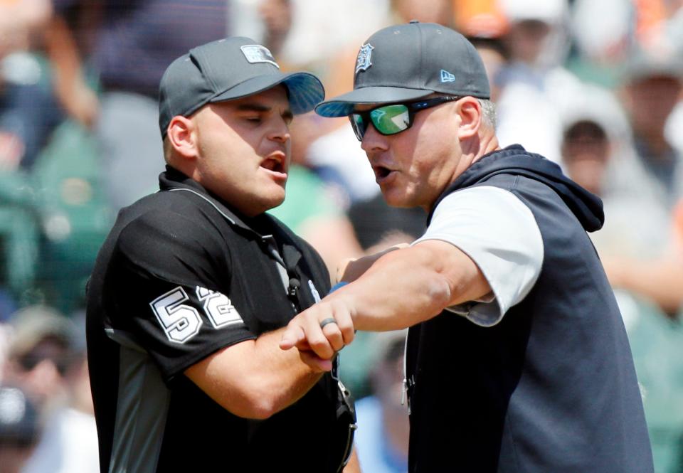 Manager A.J. Hinch (14) of the Detroit Tigers argues with home plate umpire Jansen Visconti (52) after being ejected during the third inning at Comerica Park on June 19, 2022, in Detroit, Michigan.