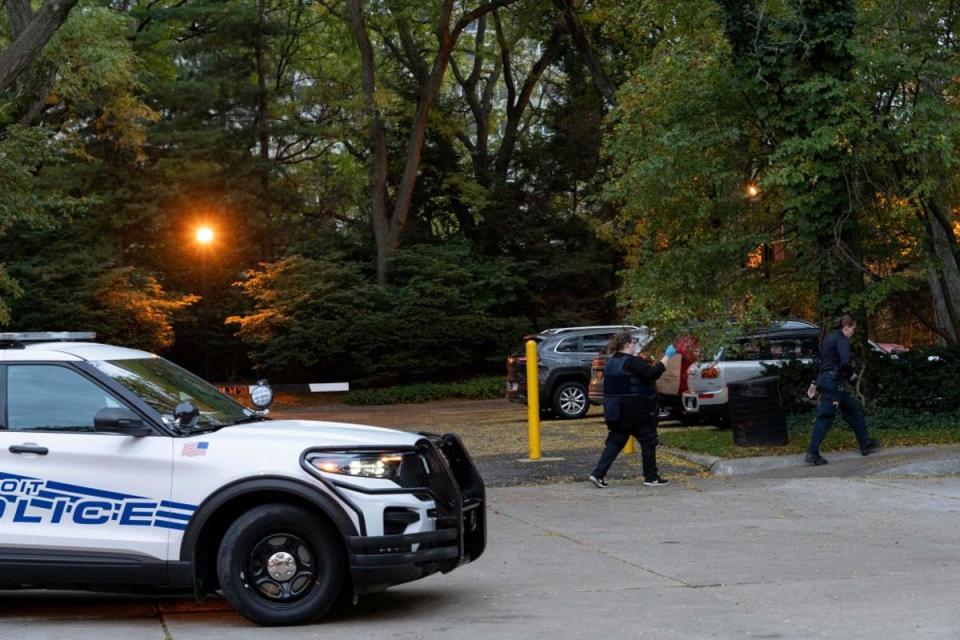 Detroit police officers work near the scene where Isaac Agree Downtown Synagogue president, Samantha Woll, was found dead (AFP via Getty Images)