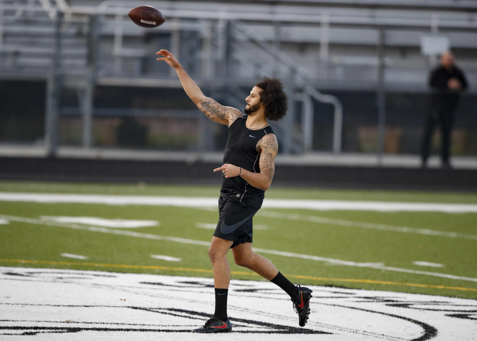 Free agent quarterback Colin Kaepernick participates in a workout for NFL football scouts and media, Saturday, Nov. 16, 2019, in Riverdale, Ga. (AP Photo/Todd Kirkland)