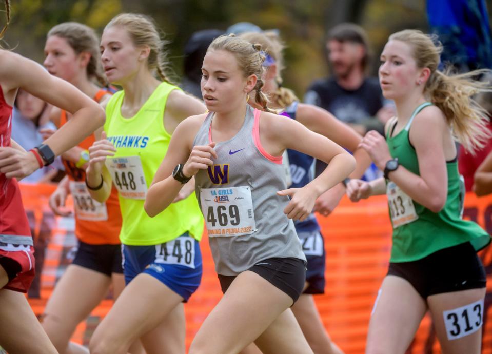 Williamsville's Louisa Wilson (469) maneuvers through the pack for a third-place finish in the Class 1A girls state cross-country meet Saturday, Nov. 5, 2022 at Detweiller Park in Peoria. Wilson ran the course in 17:27.00.
