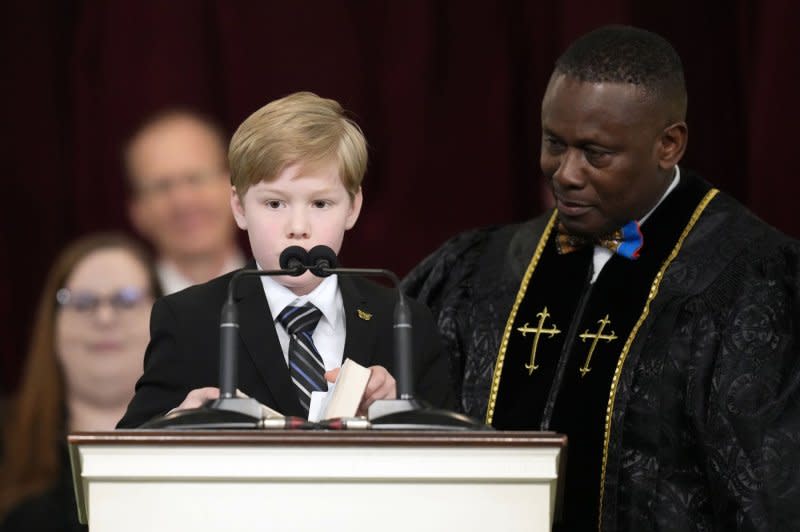 Great grandchild Charles Jeffrey Carter reads a scripture during Wednesday's funeral service for former first lady Rosalynn Carter at Maranatha Baptist Church in Plains, Ga. Pool Photo by Alex Brandon/UPI