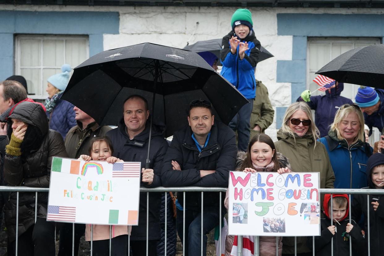 Members of the public gather in Carlingford (PA)
