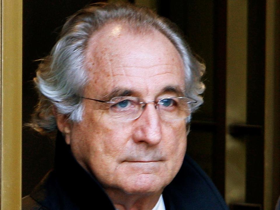 FILE PHOTO: Bernard Madoff exits the Manhattan federal court house in New York in this January 14, 2009 file photo.   REUTERS/Brendan McDermid