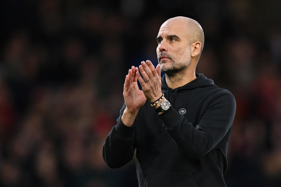 NOTTINGHAM, ENGLAND - FEBRUARY 18: Pep Guardiola, Manager of Manchester City, applauds their fans after the side&#39;s  during the Premier League match between Nottingham Forest and Manchester City at City Ground on February 18, 2023 in Nottingham, England. (Photo by Michael Regan/Getty Images)