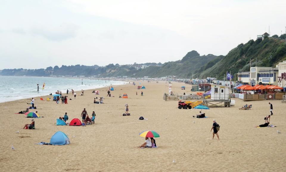 People on Bournemouth beach in Dorset. Bournemouth has been identified by Rightmove as the most in-demand seaside location for home buyers in 2021 (Andrew Matthews/PA) (PA Wire)