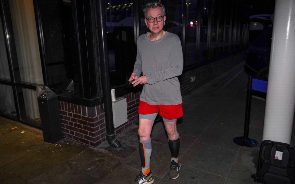 Michael Gove MP returns from a morning run to the Hyatt Regency Birmingham - Ian Forsyth /Getty Images Europe