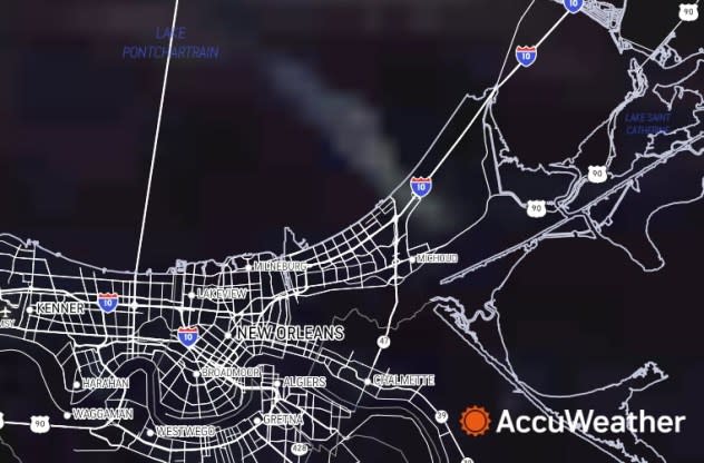 AccuWeather RealVue™ Satellite shows smoke streaming northwestward across I-10 northeast of New Orleans at 7:50 a.m. CST, approximately 3 hours after the accident occurred.