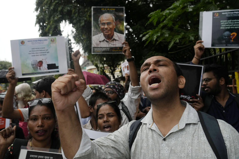 People shout slogans during a rally on the 10th death anniversary of Indian activist Narendra Dabholkar, demanding justice for his killing, in Mumbai, India, Saturday, Aug. 19, 2023. Dabholkar, a renowned rationalist, was gunned down during a morning walk 10 years ago. The nones in India come from an array of belief backgrounds, including Hindu, Muslim and Sikh. The surge of Hindu nationalism has shrunk the space for the nones over the last decade, activists say. (AP Photo/Rajanish Kakade)