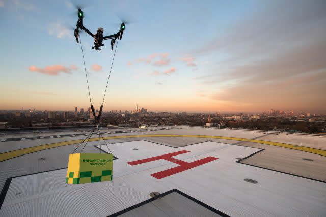 A drone, demonstrating the carrying of medical supplies