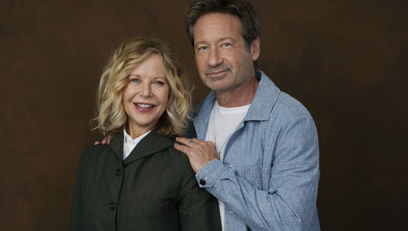 Actor-director Meg Ryan, left, poses with co-star David Duchovny at the Four Seasons Hotel in Los Angeles on Wednesday, Oct. 25, 2023, to promote their film “What Happens Later.”