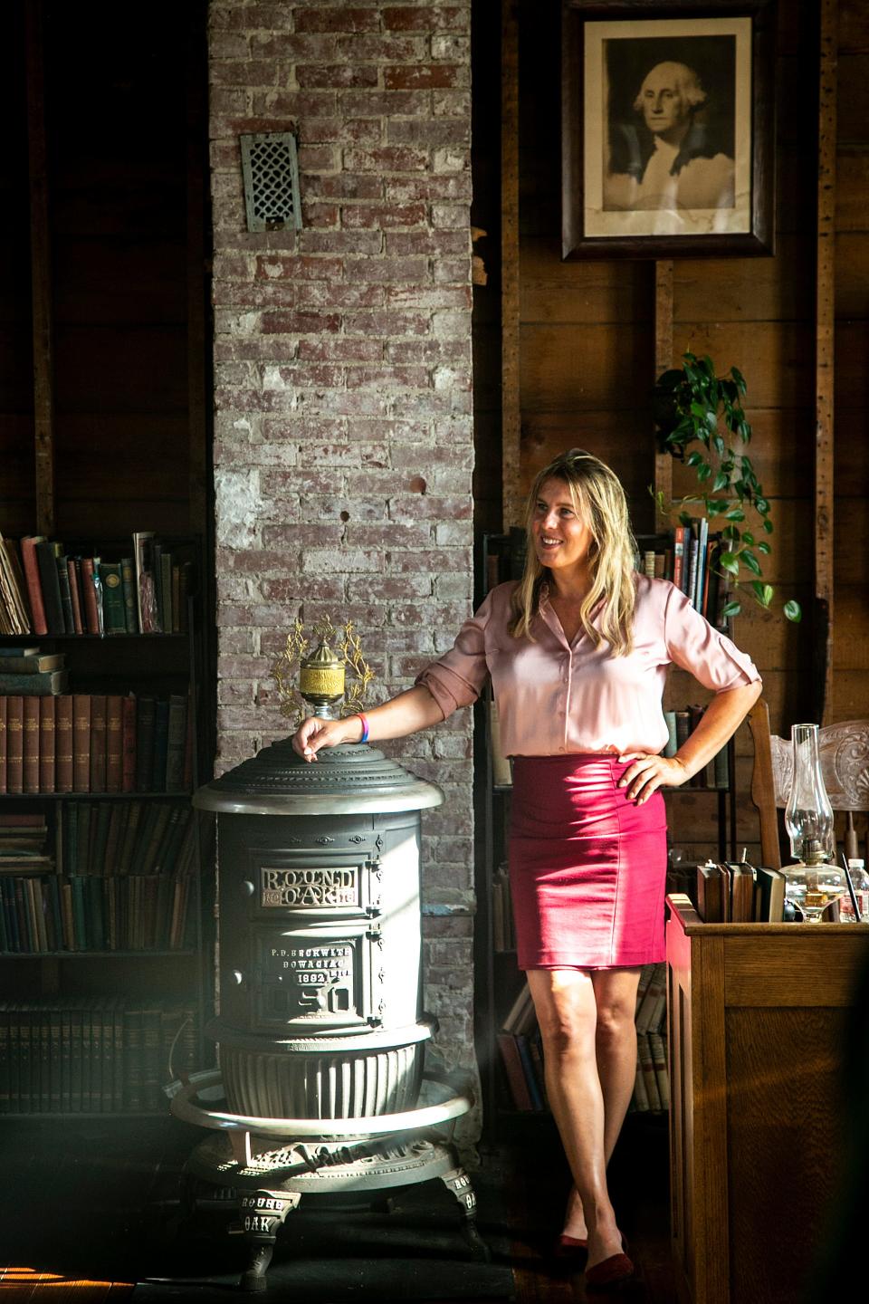 Elle Wyant, Iowa House District 91 candidate, listens during meet and greet event, Tuesday, June 28, 2022, at Maple Grove School House in Marengo, Iowa.