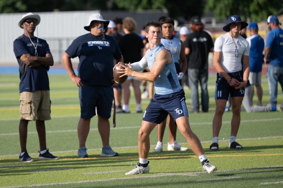 Downey quarterback Carson Lamb throw a pass during varsity passing league at Downey High School in Modesto, Calif., Tuesday, June 27, 2023.