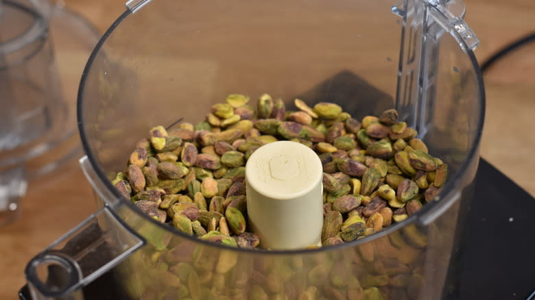 pistachios and cinnamon in food processor