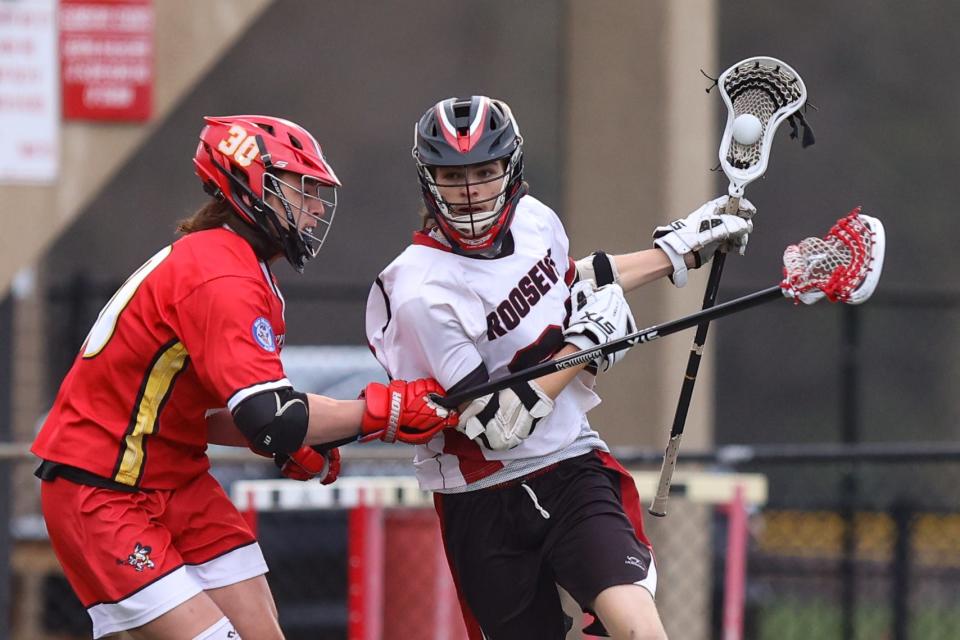 Kent Roosevelt senior Milo Rosenberg cuts infield to the net during a 2022 game against Brecksville-Broadview Heights at Roosevelt Stadium.