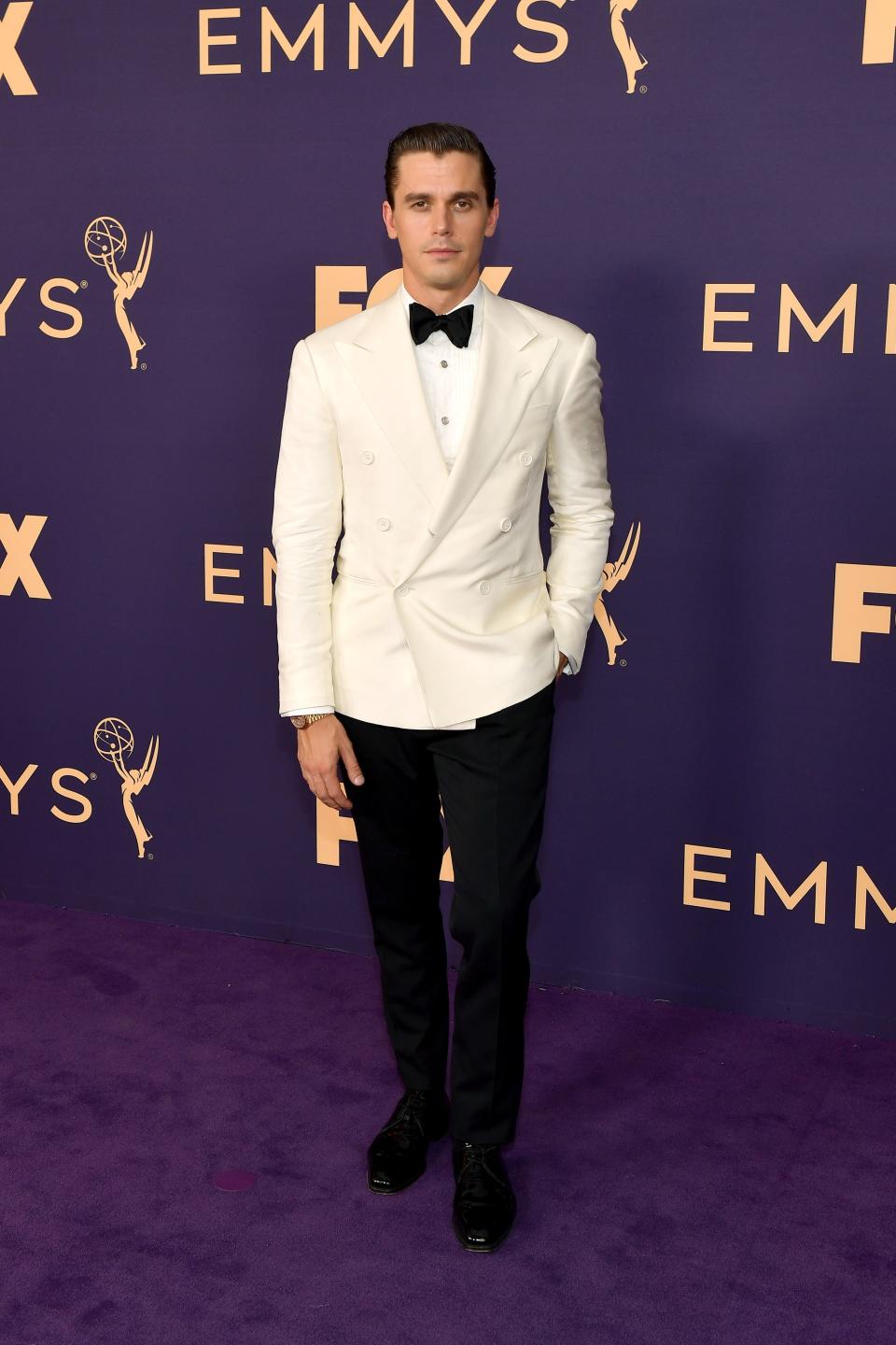 <h1 class="title">Antoni Porowski in Custom Ralph Lauren Purple Label and Fred Leighton jewelry</h1><cite class="credit">Photo: Getty Images</cite>