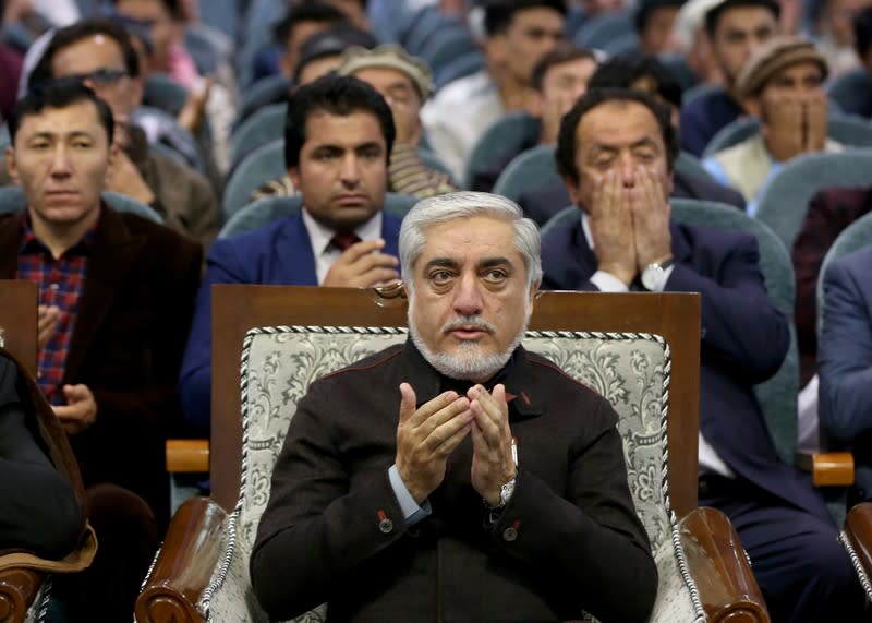 Afghanistan's presidential candidate Abdullah Abdullah attends a gathering with his supporters in Kabul