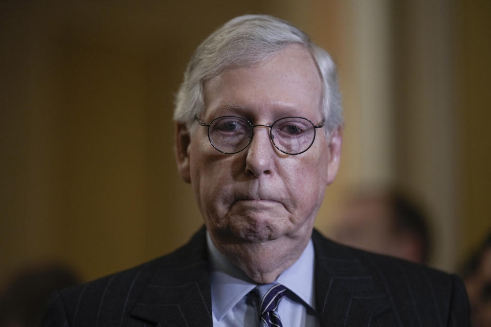 Senate Republican Leader Mitch McConnell, R-Ky., emerges from a lengthy closed-door meeting about the consequences of the GOP performance in the midterm election, at the Capitol in Washington, Tuesday, Nov. 15, 2022. (AP Photo/J. Scott Applewhite)