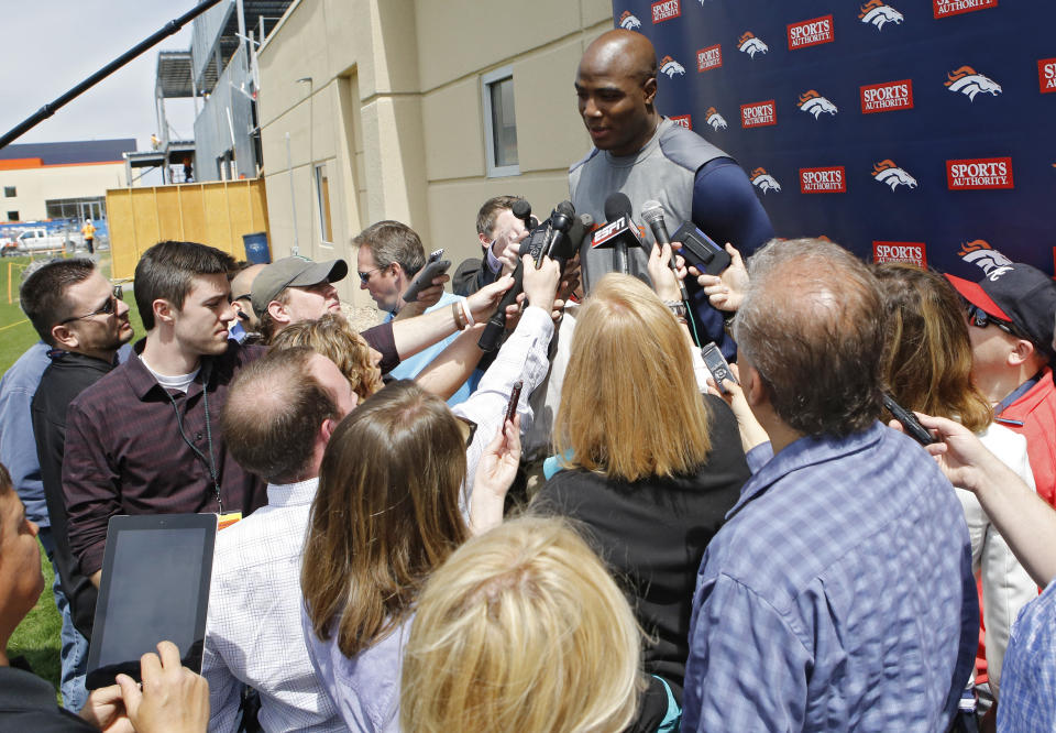 Denver Broncos defensive end DeMarcus Ware talks to the media after working out at the NFL football teams training facility in Englewood, Colo., on Monday, April 21, 2014. (AP Photo/Ed Andrieski)