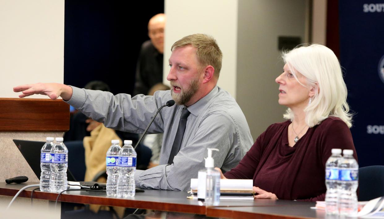 Scott Leopold, director of planning services with HPM, speaks Monday, Feb. 6, 2023, at the South Bend school board meeting where the discussion begins on the future direction of the facilities needed for the South Bend school district. At right is Mary Krupinski, project manager with Fanning Howey.