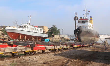 FILE PHOTO: Iraqi ships are repaired at a shipyard built by the British Army on Basra's docks in 1916, in Basra, Iraq December 23, 2018. Picture taken December 23, 2018. REUTERS/Essam al-Sudani