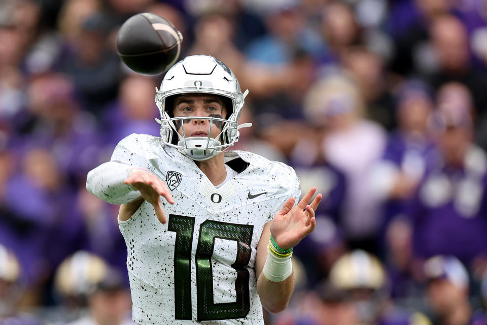 Oregon QB Bo Nix passes during the second quarter against Washington on Saturday. (Steph Chambers/Getty Images)
