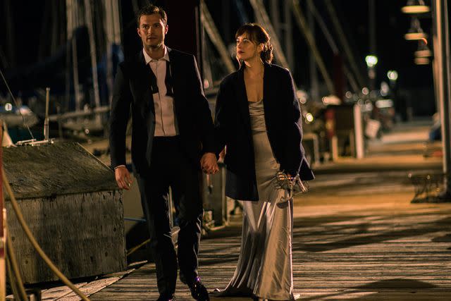 <p>Doane Gregory/Universal Pictures </p> Jamie Dornan and Dakota Johnson in Fifty Shades Darker