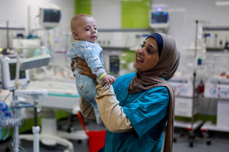 Separated by Israeli checkpoint, Gazan parents yearn to see their infant