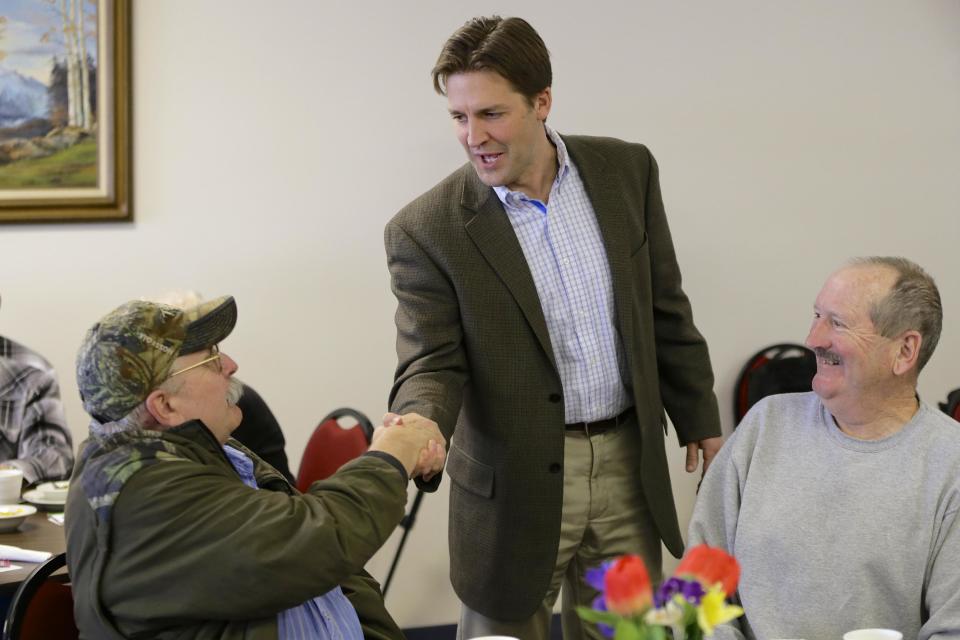 In this March 12, 2014 photo Nebraska Republican Senate candidate Ben Sasse, the president of Midland University, campaigns in Elmwood, Neb. Nebraska, home of nice-guy politics, is a new front in the bitter national struggle inside the Republican Party between established leaders determined to maintain control and right-wing insurgents trying to change the party’s direction. Tea party groups are endorsing Sasse and party powerbrokers including Senate Minority Leader Mitch McConnell and his allies are quietly backing his opponent, Shane Osborn, and steering the majority leader’s donors his way. (AP Photo/Nati Harnik)