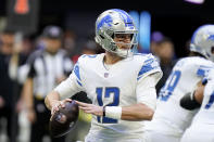 Detroit Lions quarterback Tim Boyle (12) passes in the pocket against the Atlanta Falcons during the first half of an NFL football game, Sunday, Dec. 26, 2021, in Atlanta. (AP Photo/Brynn Anderson)