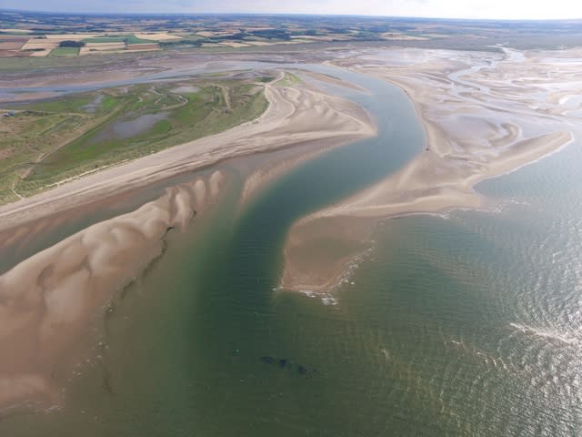 Aerial images show WW1 wreck emerging from sea