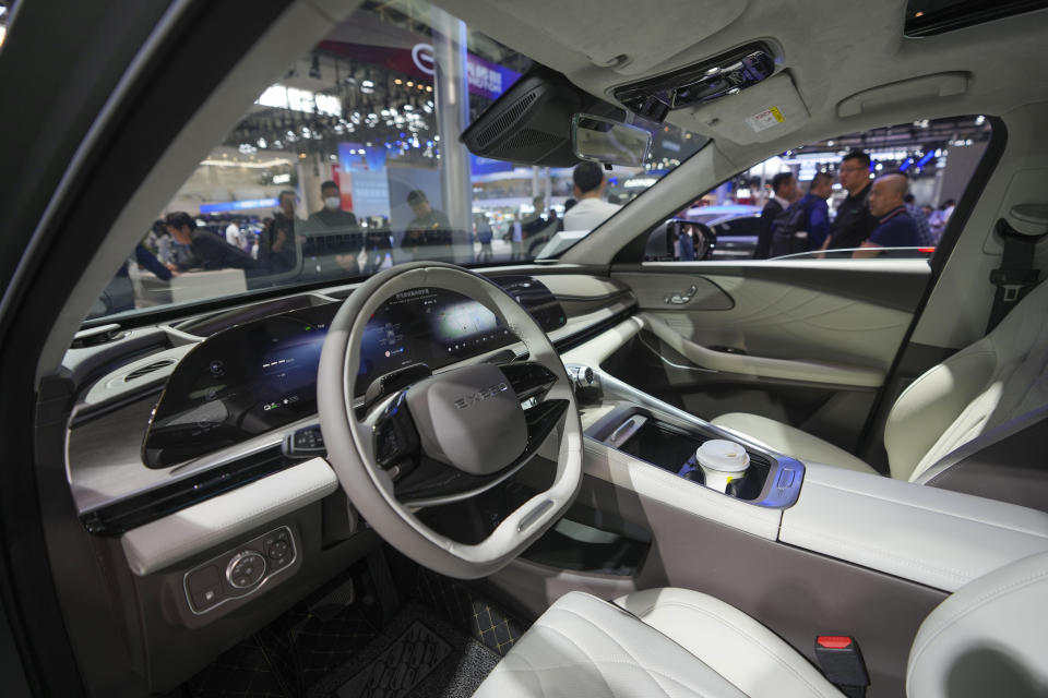 An interior of an Exeed C-DM car is seen during the China Auto Show in Beijing, China, Friday, April 26, 2024. China's vision of the future of the automobile electrified and digitally connected is on display at the ongoing Beijing auto show. (AP Photo/Tatan Syuflana)