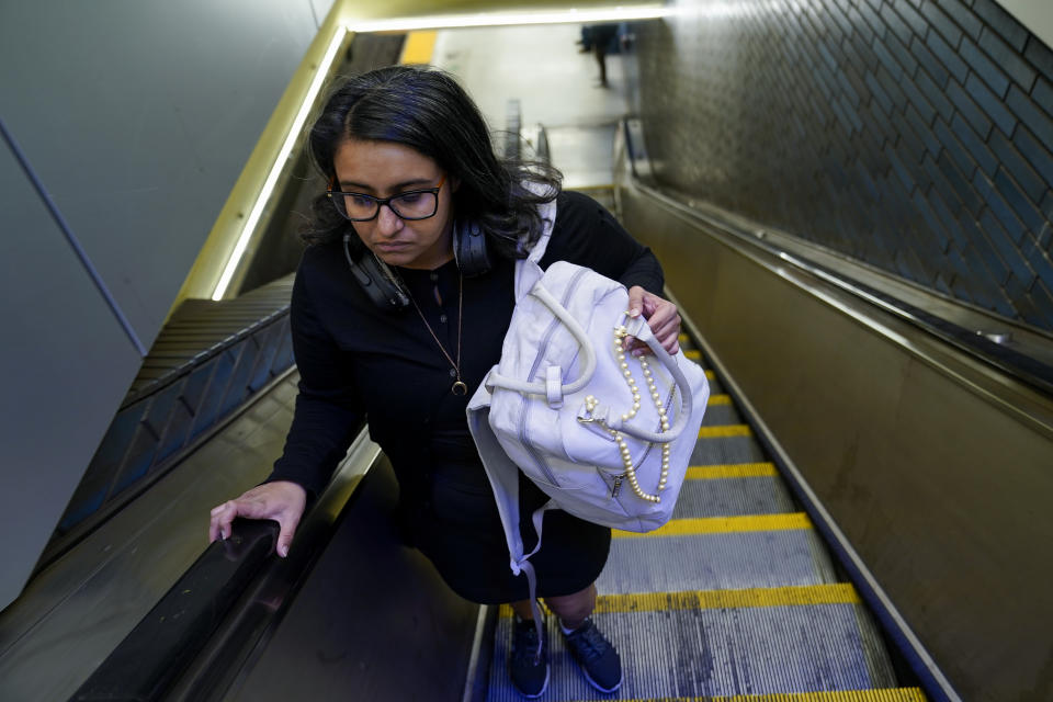 Sadaf Zahoor is photographed inside a Bay Area Rapid Transit station, Wednesday, June 7, 2023, in Oakland, Calif. Zahoor has used public transit her whole life and relies on it to get to work. (AP Photo/Godofredo A. Vásquez)