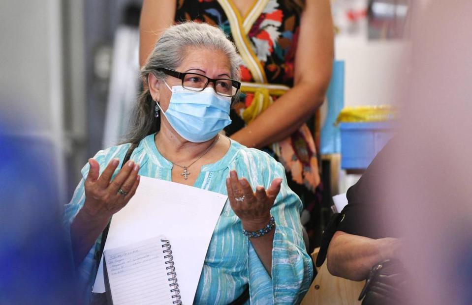 Dolores Diaz expresses her concerns to California Attorney General Rob Bonta as he listened to environmental justice issues in Fresno County with local organizations and community leaders Tuesday, Aug. 9, 2022 in Fresno.