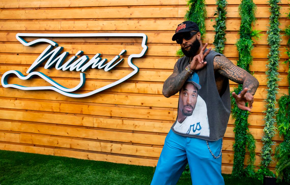 Miami Dolphins wide receiver Odell Beckham Jr. strikes a pose in the paddocks ahead of the Formula One Miami Grand Prix at the Miami International Autodrome on Sunday, May 5, 2024, in Miami Gardens, Fla.