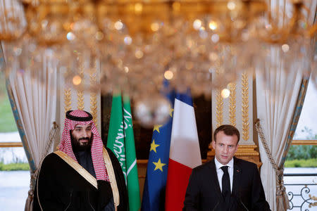 French President Emmanuel Macron and Saudi Arabia's Crown Prince Mohammed bin Salman attend a press conference at the Elysee Palace in Paris, France, April 10, 2018. Yoan Valat/Pool via Reuters