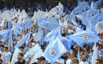 <p>Manchester City fans cheer prior to the English Premier League soccer match between Manchester City and Huddersfield Town at Etihad stadium in Manchester, England, Sunday, May 6, 2018. (AP Photo/Rui Vieira) </p>