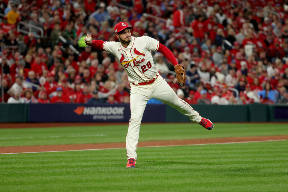 ST LOUIS, MISSOURI - OCTOBER 08: Nolan Arenado #28 of the St. Louis Cardinals fields a ground ball against the Philadelphia Phillies during the seventh inning in game two of the National League Wild Card Series at Busch Stadium on October 08, 2022 in St Louis, Missouri. (Photo by Stacy Revere/Getty Images)