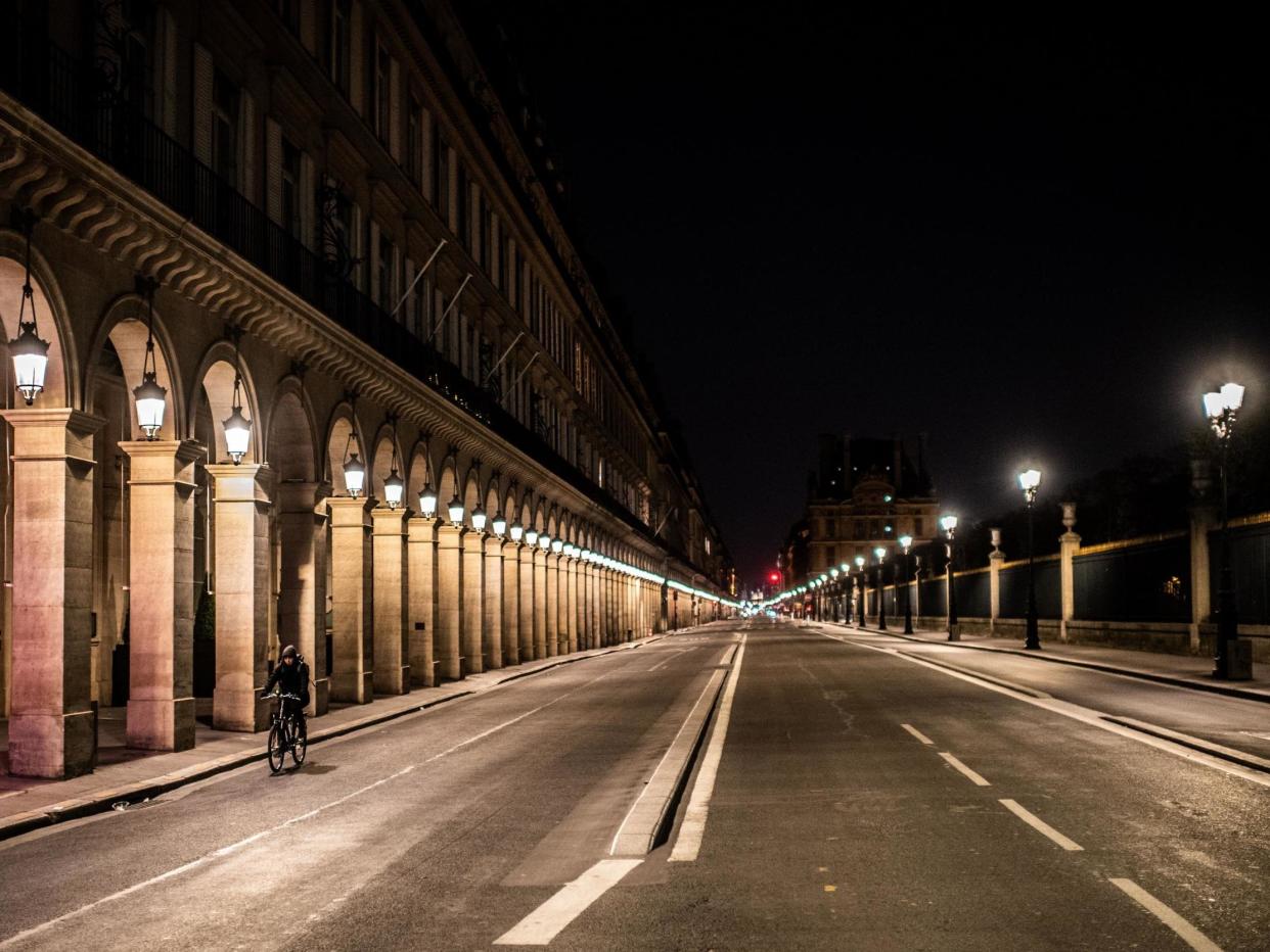 A picture shows Rue de Rivoli in Paris, on March 26, 2020 on the evening of the tenth day of a strict lockdown in France: MARTIN BUREAU/AFP via Getty Images