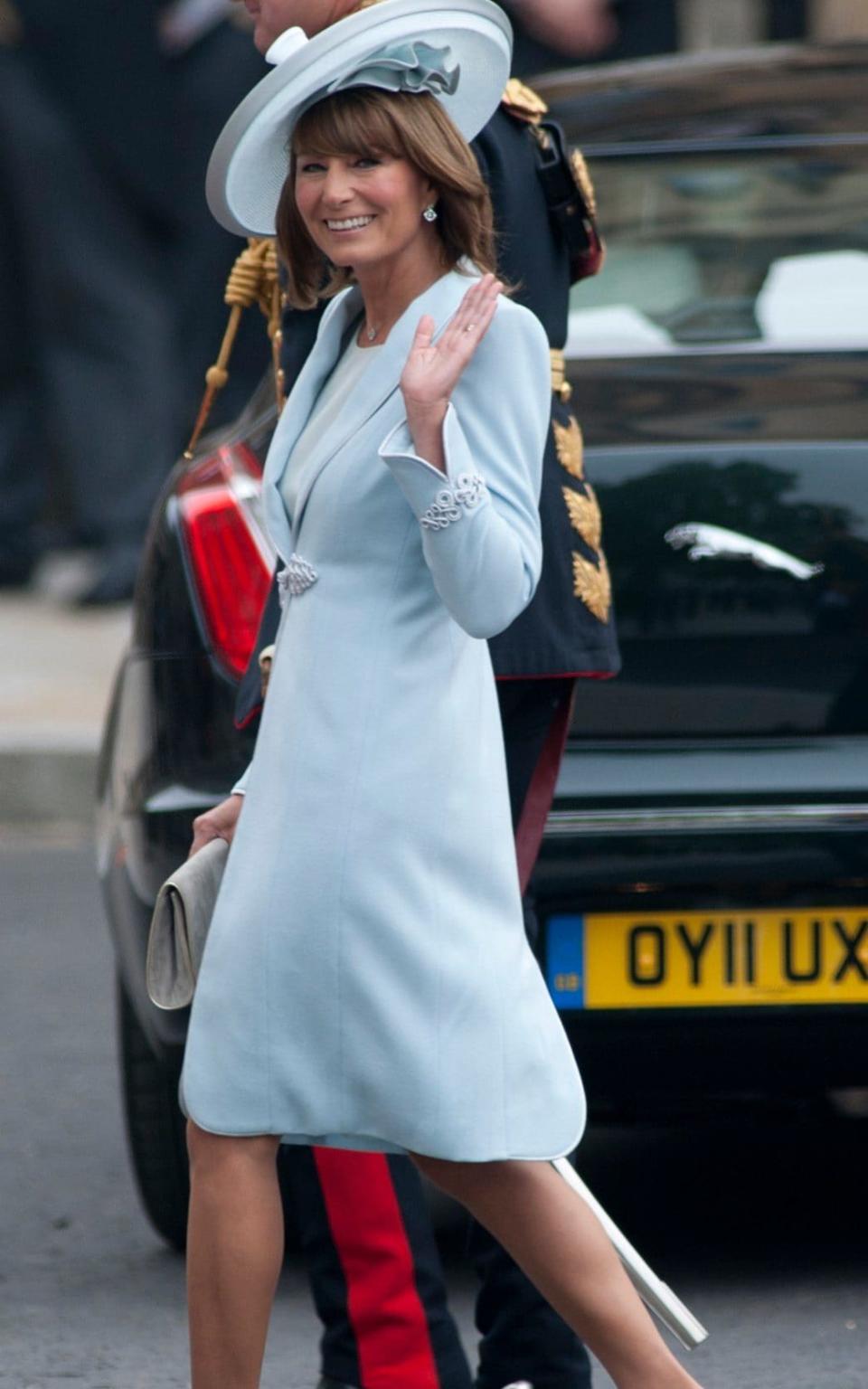 Carole Middleton arrives for the wedding of her eldest daughter Catherine - Credit:  Christopher Pledger