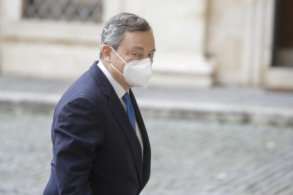 Former European Central Bank President Mario Draghi arrives at the Quirinale presidential palace for talks with Italian President Sergio Mattarella to discuss a mandate to form a new government, in Rome, Wednesday, Feb. 3, 2021. (AP Photo/Andrew Medichini)