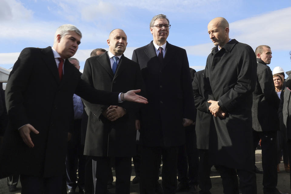 Bulgarian President Rumen Radev, second from left, and President of Serbia Aleksandar Vucic, second from right, attend the opening of the construction of the intersystem gas connection Bulgaria-Serbia, in the village of Golyanovtsi, Bulgaria, Wednesday, Feb.1, 2023. The presidents of Bulgaria and Serbia on Wednesday launched the construction of the Bulgarian part of a gas link that is designed to diversify the energy supplies of a region that until recently was almost fully dependent on natural gas deliveries from Russia. (AP Photo/Valentina Petrova)